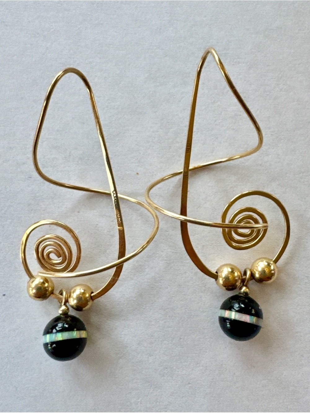 Gold Spiral Drop Earrings with Black Abalone Accent